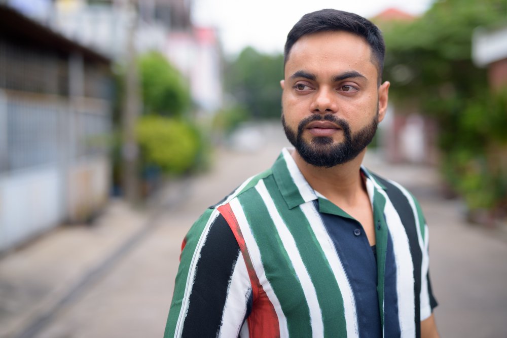 portrait-young-handsome-bearded-indian-man-streets-outdoors.jpg portrait-young-handsome-bearded-indian-man-streets-outdoors.jpg